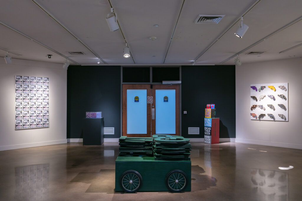 Center Foreground: Roland Bernier, GPT (2003), 32 x 48 x 48 inches, mixed media, wood, paint and rope, (Represented by Walker Fine Art)