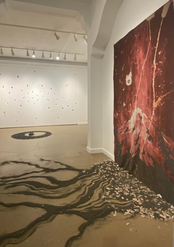 Installations by Mucyo (Rwanda) and Ásgeirsson (Iceland) using lava sourced from their respective countries. In Hawai’i, lava is considered sacred property of the volcano goddess Pele, who delivers swift retribution to those who dare to remove pieces from Hawai'i