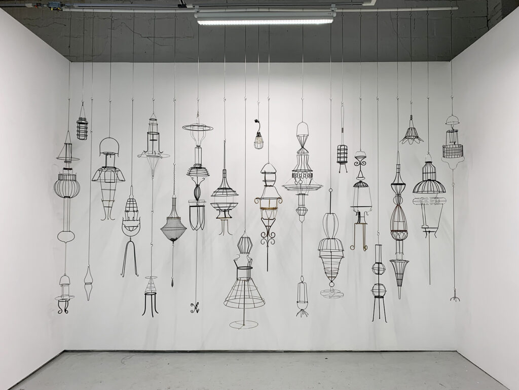 Ginette Legaré, Lineup / Délictuelles, 2022, reclaimed metal/wire objects and customized hooks, 335 x 412 x 58 cm (11’ x 13 1⁄2’ x 23”) (variable dimensions)