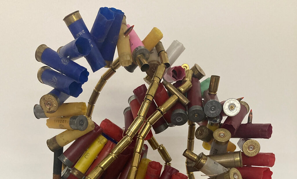 Margaret Roleke, Pink (detail) (2022), wire, spent shotgun shells, brass, 15 x 13 x 14 inches