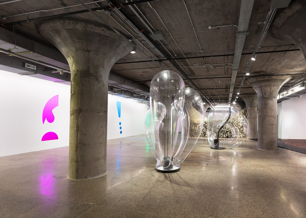 Kapwani Kiwanga, Vivarium: Apomixis, 2023 (foreground), Vivarium: Adventitious, 2023 (background). PVC transparent, steel, colour, MDF. Installation View, Remediation, at MOCA Toronto. Courtesy the artist; Galerie Poggi, Paris; Galerie Tanja Wagner, Berlin; and Goodman Gallery, Cape Town, Johannesburg, and London. © ADAGP, Paris / SOCAN, Montreal (2022). Photo: Laura Findlay