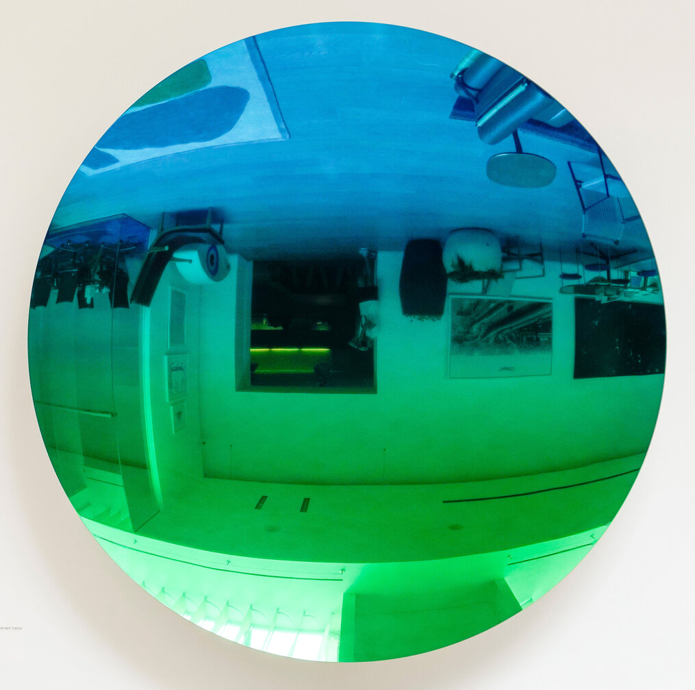 Anish Kapoor, Mirror (Mipa Blue to Organic Green), 2016. Stainless steel and lacquer. On loan from George Yabu and Glenn Pushelberg. Photography credit: Connor Remus.